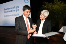 Prof. Joseph Sung receiving the Endoscopy Award 2009 in recognition of his outstanding scientific achievements in therapeutic endoscopy and continuous support to international exchange and training of researchers