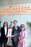 Prof. Joseph Sung presents a souvenir to Prof. and Mrs. Wu Weishan