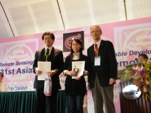 Miss Tan Lu (middle) receives the Best Young Author Award at the Asian Conference on Remote Sensing