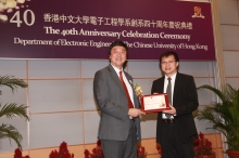 Prof. Joseph Sung presents the Distinguished Alumni Award to Dr. the Hon Samson W.H. Tam, (right)