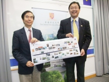 Prof. C.P. Wong, Dean of Engineering (left) and Prof. K.F. Wong, Associate Dean (External Affairs), Faculty of Engineering showcase the milestones of the Engineering Faculty in the past twenty years