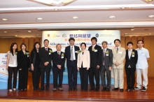 A group photo of officiating guests and representatives from Database supporting organizations