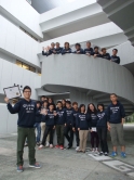 A group photo of the winning students and their coaches