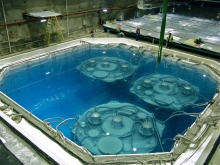 Three antineutrino detectors submerged in pure water in the Daya Bay Far Hall, each being 5m in height and diameter.  The Hong Kong team designed and built a subsystem in each of the detectors.