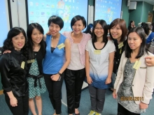 Prof. Kaman Lee with students in class.