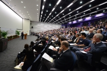 The lecture attracts an audience of close to 400.