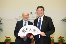 Prof. Joseph Sung, CUHK Vice-Chancellor presents a CUHK 50th anniversary souvenir to Prof. Ezra Vogel.