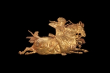 Hammered gold plaque with a horse and mounted archer 
7th to 9th century 
Length: 31.1 cm