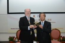 Prof. Alvin Leung, Dean, Faculty of Education (right) presents a CUHK 50th anniversary souvenir to Prof. Marsh.