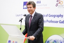 Henri de Castries, Chairman & CEO of the AXA Group, explains to the audience it is important that AXA Group could better understand risks faced by human beings through research.