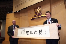 Prof. Joseph Sung presenting his calligraphy as a token of appreciation to keynote speaker, Prof. Andrew Hamilton, University of Oxford