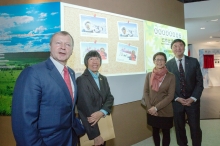 The guests tour around the Jockey Club Museum of Climate Change.