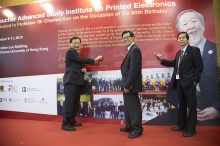 (From left) Prof. Benjamin Wah; Prof. P.C. Ching, Pro-Vice-Chancellor; and Prof. C. P. Wong, Dean of Engineering, sign at the ceremony.