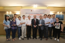 Prof Henry Wong, Dean of Faculty of Science (middle), Professor Lam (5th right) and his team members at the Center for Soybean Research, CUHK.