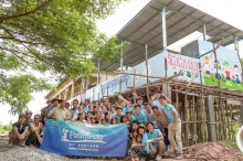 11 CUHK students build an overhead platform to hold toilet facilities for a primary school in Cambodia.