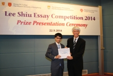 Prof. Joseph Yam, Distinguished Research Fellow of the Institute of Global Economics and Finance, CUHK (right) presents the Grand Prize to Mr. Arjyo MITRA.