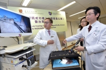 Professor CHIU Wai Yan Philip (right), Assistant Dean (External Affairs) of CUHK Faculty of Medicine and Director of the CUHK Jockey Club Minimally Invasive Surgical Skills Centre, and Professor WU Che Yuen Justin (left), Associate Dean (Development) of CUHK Faculty of Medicine and Director of the S.H. Ho Centre for Digestive Health, demonstrate the minimally invasive procedure to implant pulse generator.