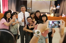 Professor Sung celebrates the Mid-Autumn Festival with staff.