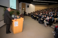 The lecture is well received by an audience of 300.