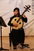 Performance of the exhibition theme song by a student from the Department of Music.