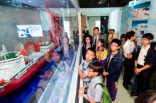 Prof. Joseph Sung, Vice-Chancellor and President of CUHK, guests and students visit the Jockey Club Museum of Climate Change.