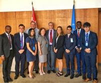 Kelvin Ho (1st right) poses for a photo with his colleagues at World Information Transfer.