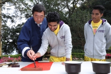 Prof. Joseph Sung sends his blessings through calligraphy.