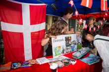 Nordic students interact with visitors at the activity booths.