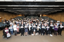 Participants from different sectors of society hold slogans of #TIMESUP and #Breaking Silence(#打破沉默) at the seminar co-organised by the Equal Opportunities Commission and the Gender Research Centre of The Chinese University of Hong Kong to express their determination to eliminate sexual harassment in the community together.