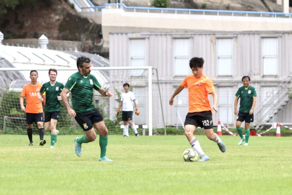 Players from both teams compete hard during the game.