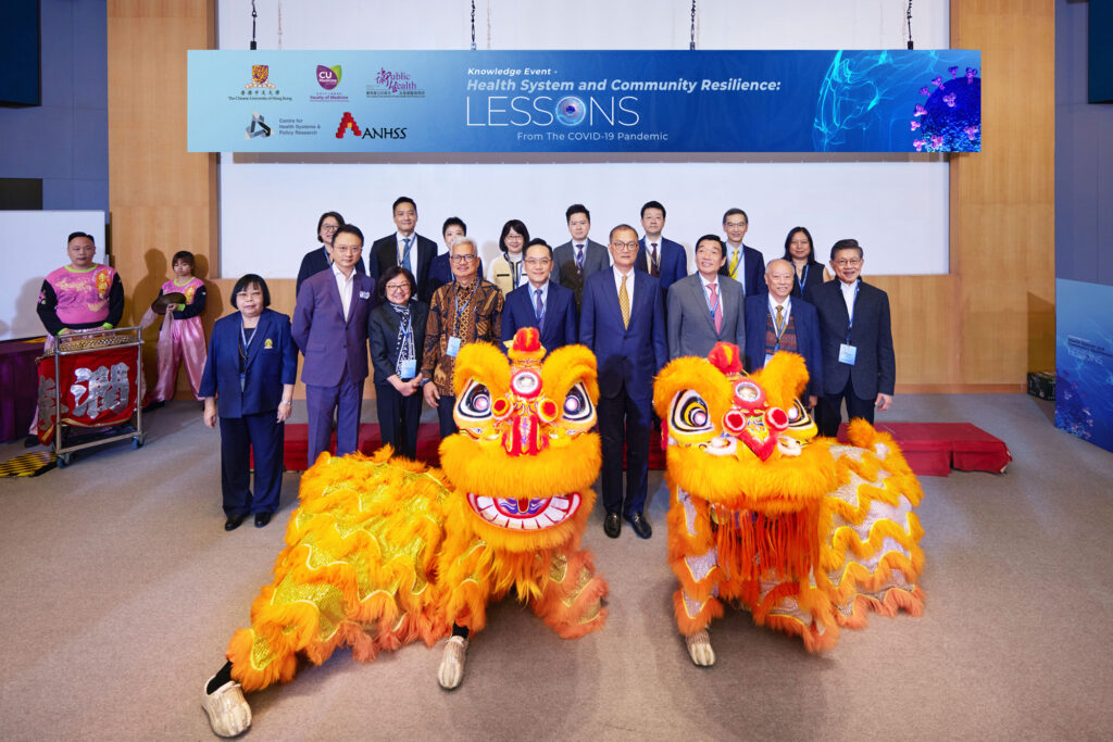 This photo features the opening ceremony of The Regional Knowledge Event – Health System and Community Resilience: Lessons from the COVID-19 Pandemic. Guests include Professor the Hon Lo Chung-mau, Secretary for Health of the Hong Kong Special Administrative Region (HKSAR) (4th from right, front row); Mr. Henry Fan, Chairman of the Hospital Authority (3rd from right, front row); Professor Francis Chan Ka-leung (2nd  from left, front row), Dean of CU Medicine; Dr Ronald Lam, Director of Health, HKSAR’s Department of Health Care (centre, front row); Professor Yeoh Eng-kiong, Director of the Centre of Health System and Policy Research (1st from right, front row);  Professor Samuel Wong Yeung-shan, Director of The Jockey Club School of Public Health and Primary Care at CU Medicine (2nd from left, back row); Ms. Ada Chung, The Privacy Commissioner for Personal Data, The Office of the Privacy Commissioner for Personal Data, HKSAR (4th from left, back row); and  Dr Edwin Tsui, Controller of the Centre for Health Protection, HKSAR’s Department of Health (4th from right, back row).