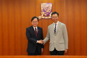 Professor John Chai, Chairman of the University Council (right), and Professor Dennis Lo.