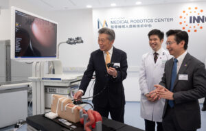 Professor Philip Chiu (right) introduces the mechanism of the novel AI-powered upper GI endoscopy system to Ambassador Kenichi Okada (left), Consul-General of Japan in Hong Kong. Mr Okada says given the unique international characteristics of Hong Kong, the achievement of this collaboration can be shared with every patient in the world.