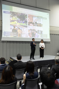 Two student ambassadors, Felix Chan Ka-chai (Left) and Carmen Cheng Ka-man, of the CUHK Jockey Club Museum of Climate Change share their experience at a panel discussion.