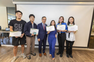 A team led by Mr Thuta Ye Moe (2nd left), a student from Yonsei University in South Korea, wins the group project competition with its ‘SkyBike’ proposal.