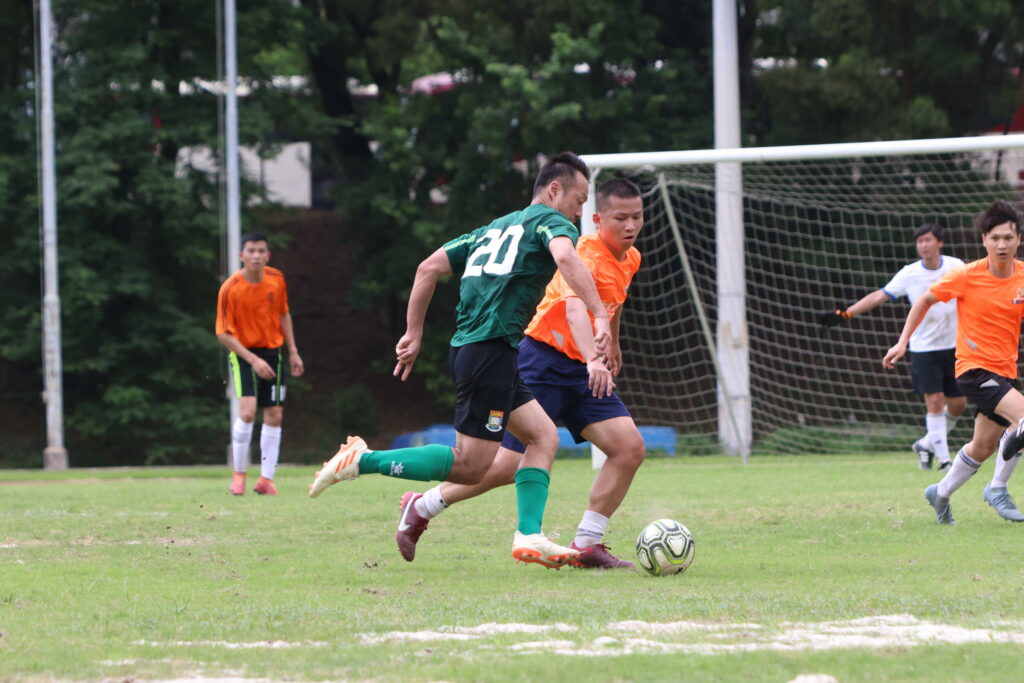 Players from both teams compete hard during the game.