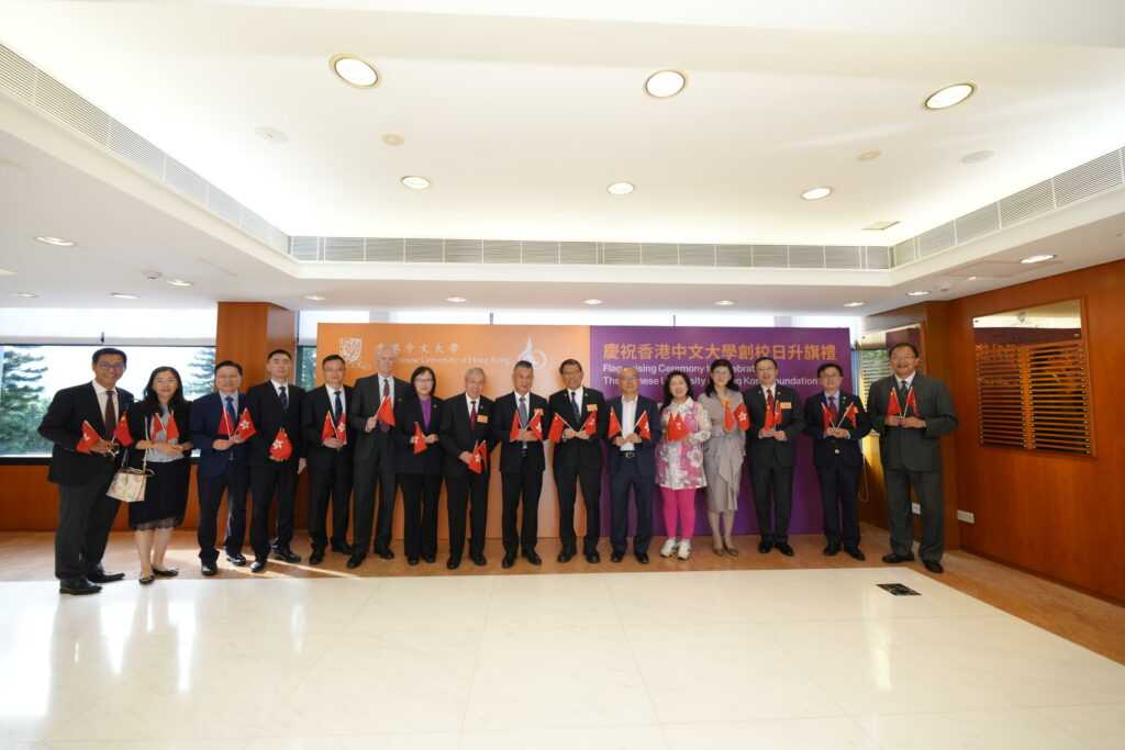 CUHK Vice-Chancellor and President Professor Rocky S. Tuan (7th right), Council member Ms Melissa Kaye Pang (4th right), Deputy Director General of the Office for Safeguarding National Security of the Central People’s Government in the Hong Kong Special Administrative Regatioin Mr Wang Wenxian (8th right), and other university members attend the flag-raising ceremony on CUHK’s Foundation Day.