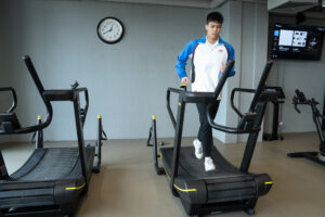 Mr Adam Mak Sai-ting exercises in CUHK's new fitness room.