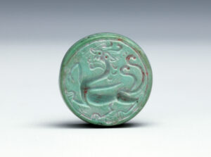 Double-sided turquoise seal <br />
Western Han Dynasty<br />
Gift of Bei Shan Tang<br />
Acc. No.: 1990.0065