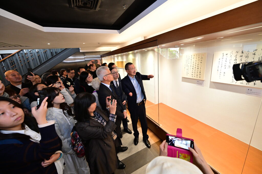 Mr Zhang Wenyou leads a curated tour of the exhibition.