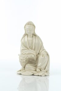 Guanyin with transparent glaze<br />
<em>He Chaozong</em> and <em>Xuande</em> seal marks<br />
Dehua ware, Fujian province<br />
Late Ming to early Qing dynasty (17th century)<br />
Gift of Mr. Jen-mou H. C. Hu<br />
Acc. no.: 1982.0077